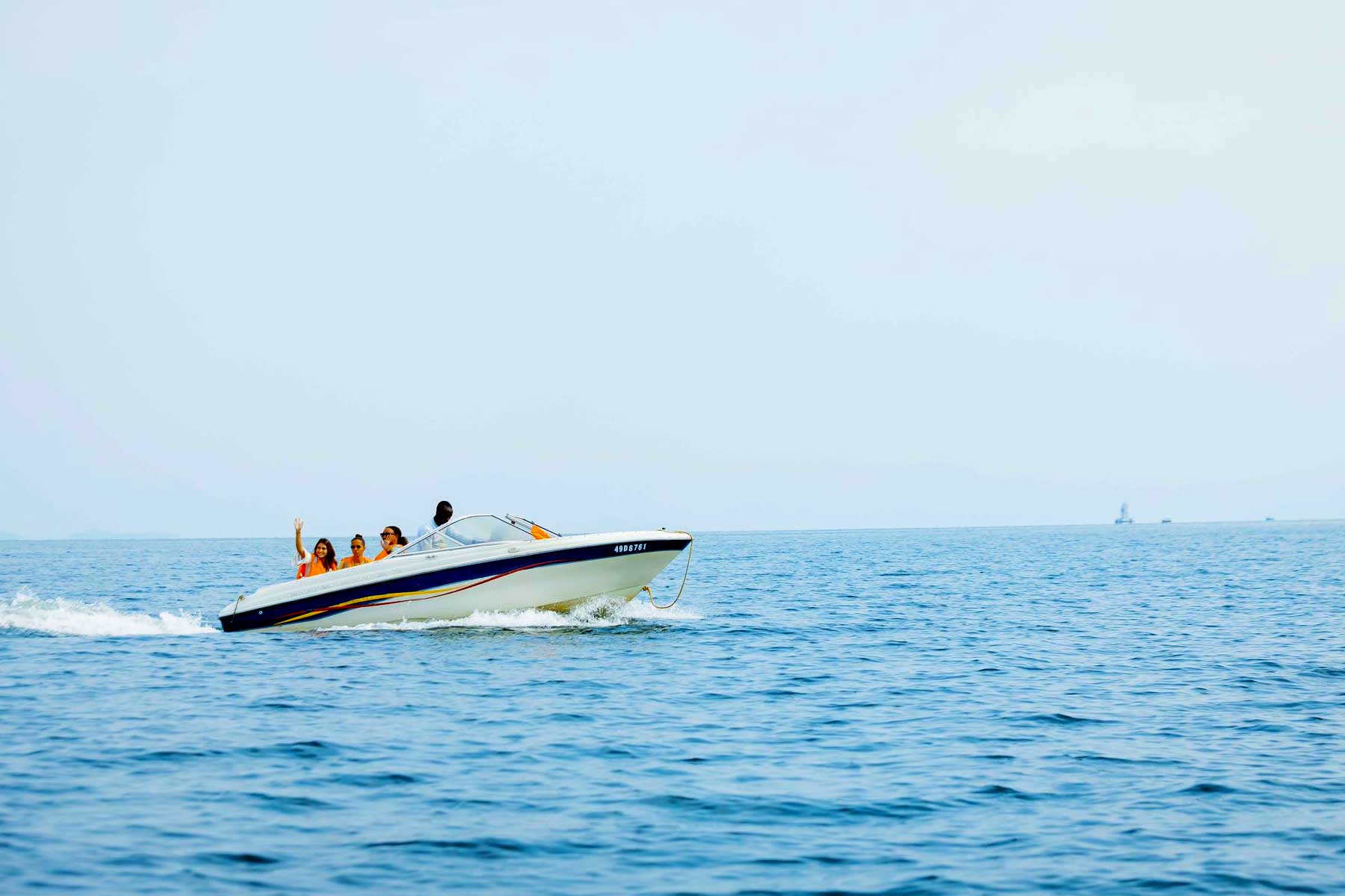 tourist are traveling by boat on lake kivu
